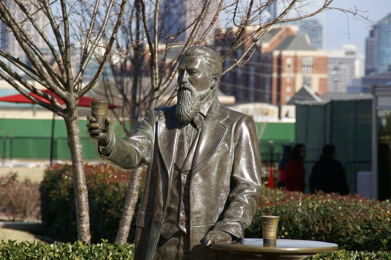 georgia statue of john pemberton holding a coca cola cup